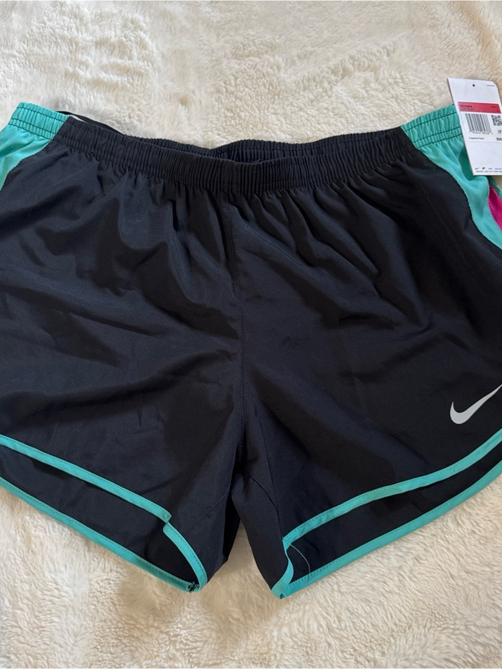 Nike Women’s Black Athletic Shorts with Teal Piping